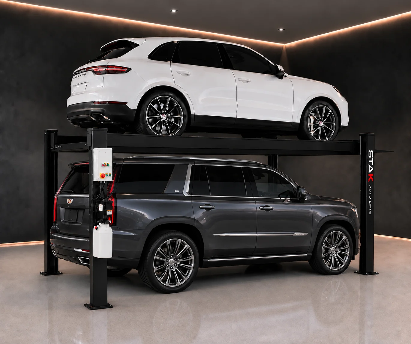 A STAK four-post lift storing a full-size SUV above a second SUV